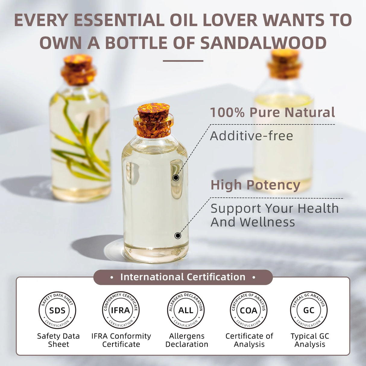 Bottle of sandalwood essential oil with certification logos on a light background