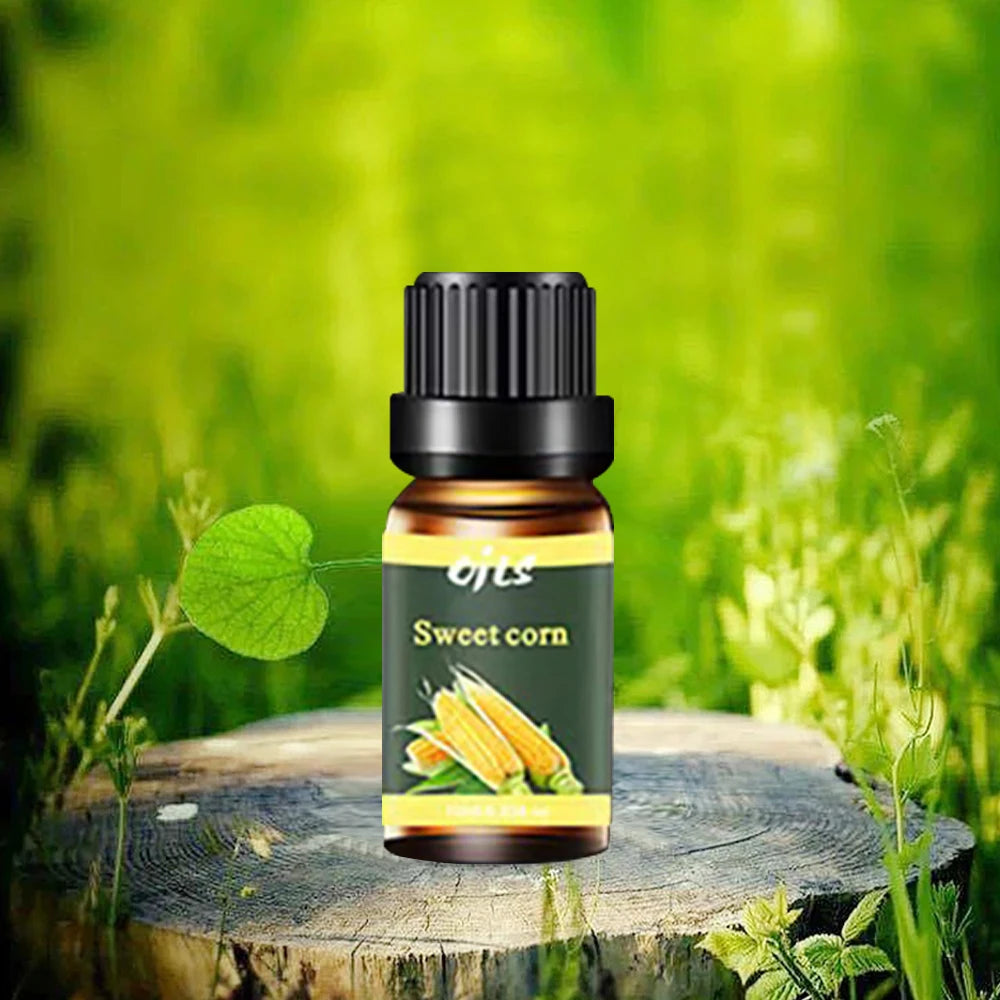 Bottle of sweet corn essential oil on a wooden stump with a green natural background