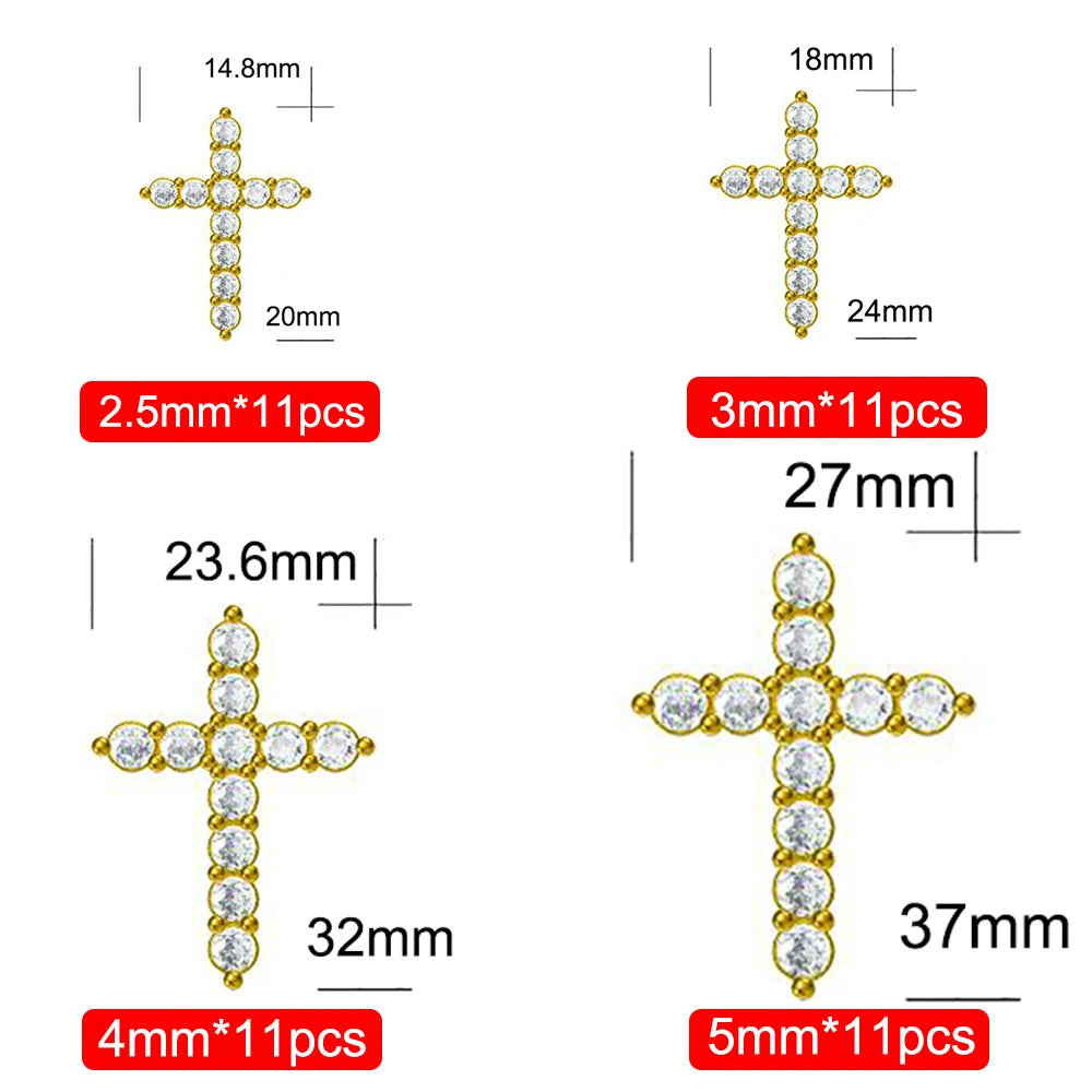 Gold cross-shaped earrings with crystal stones, showing measurements on a white background.