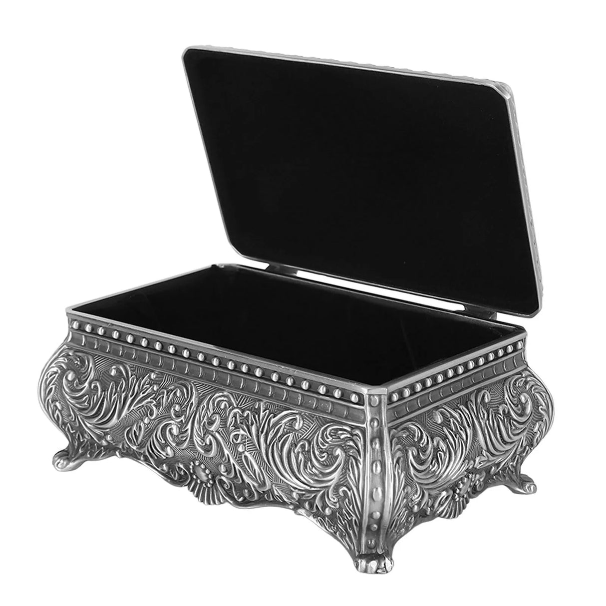 Decorative silver jewelry box with intricate designs on a white background