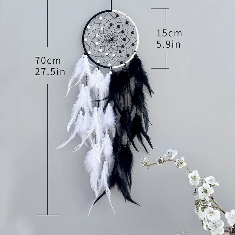 Black and white dreamcatcher with measurements on a gray background