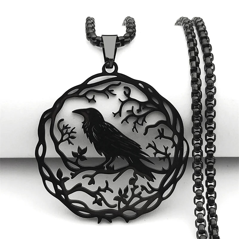 Black pendant with a crow design on a white background
