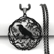 Black pendant with a crow design on a white background