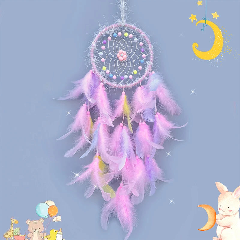 Decorative dreamcatcher with pink feathers on a blue background with cartoon elements.