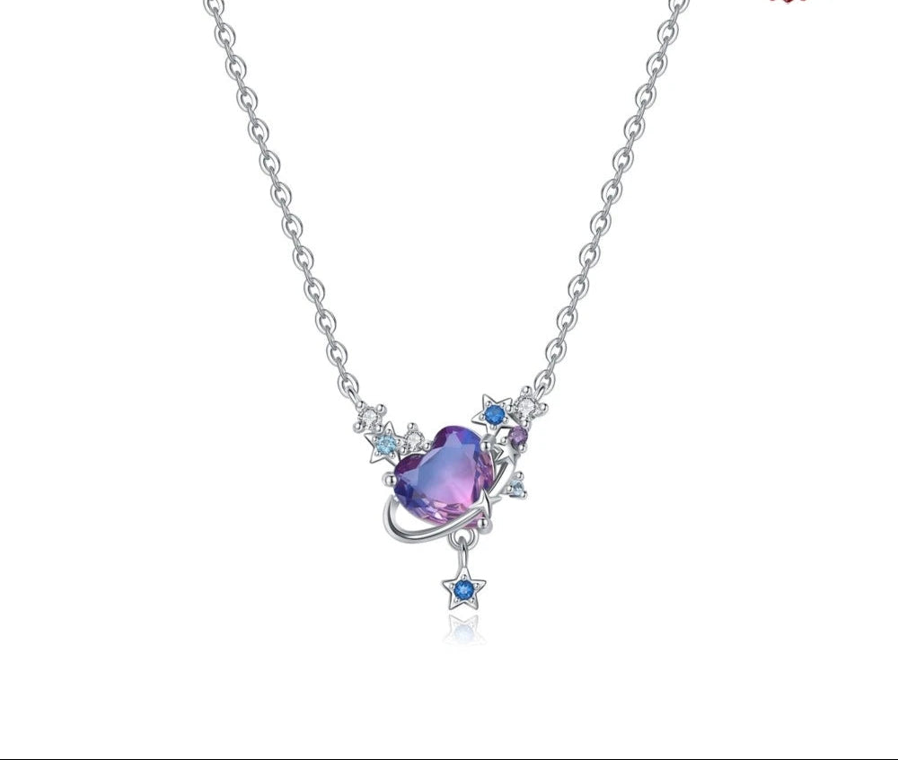 Silver necklace with a heart-shaped purple gem and star pendant on a white background, featuring Orstarry branding.