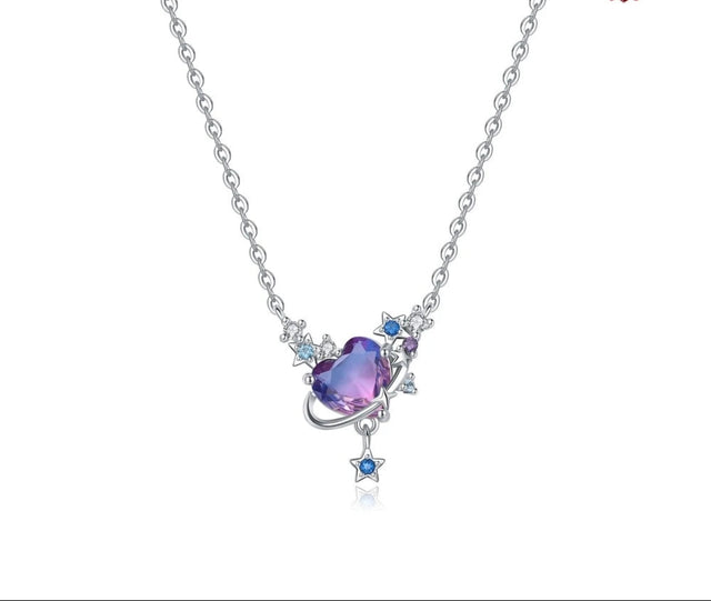 Silver necklace with a heart-shaped purple gem and star pendant on a white background, featuring Orstarry branding.