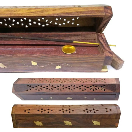 Wooden incense holder with decorative elements on a white background
