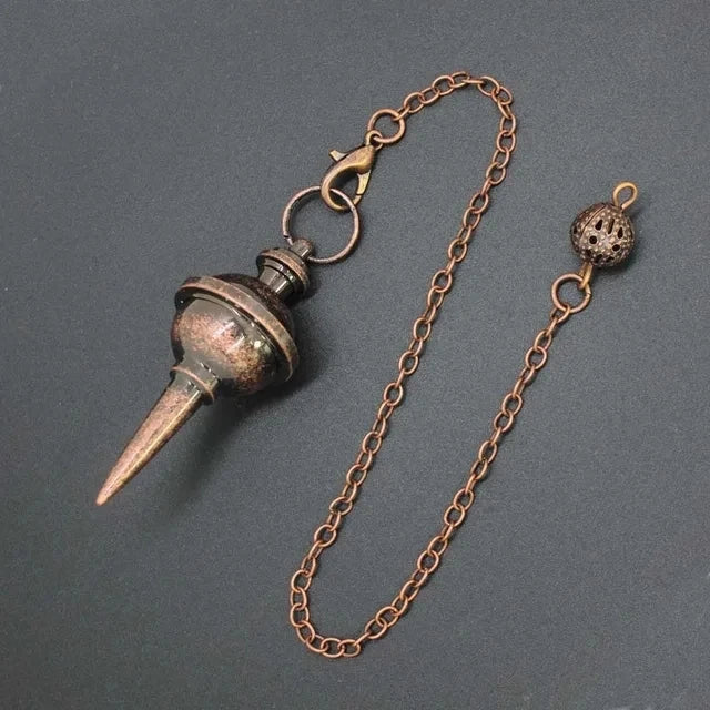 Vintage-style metal pendulum with chain on a gray background