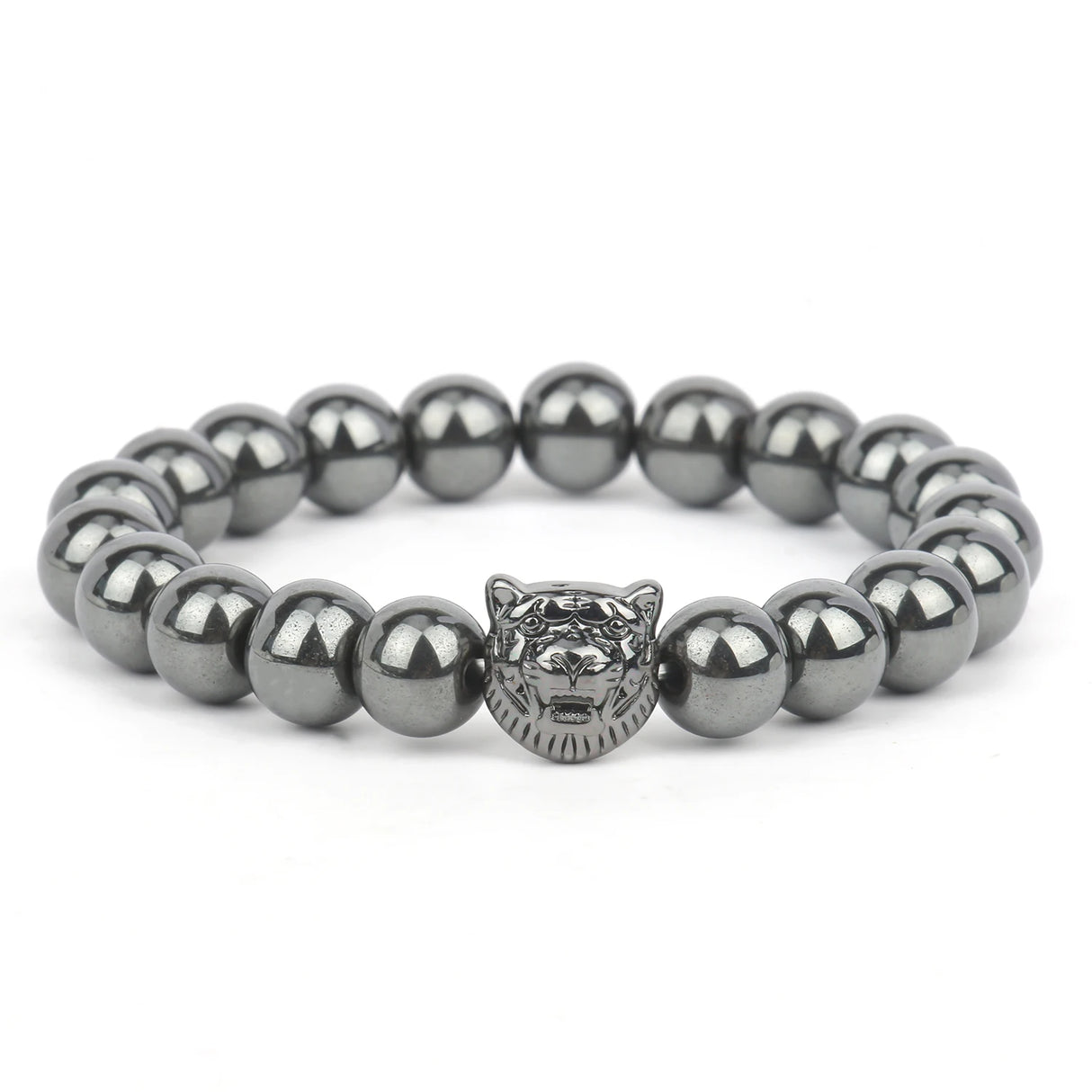 Bracelet with metallic beads and a tiger head charm on a white background