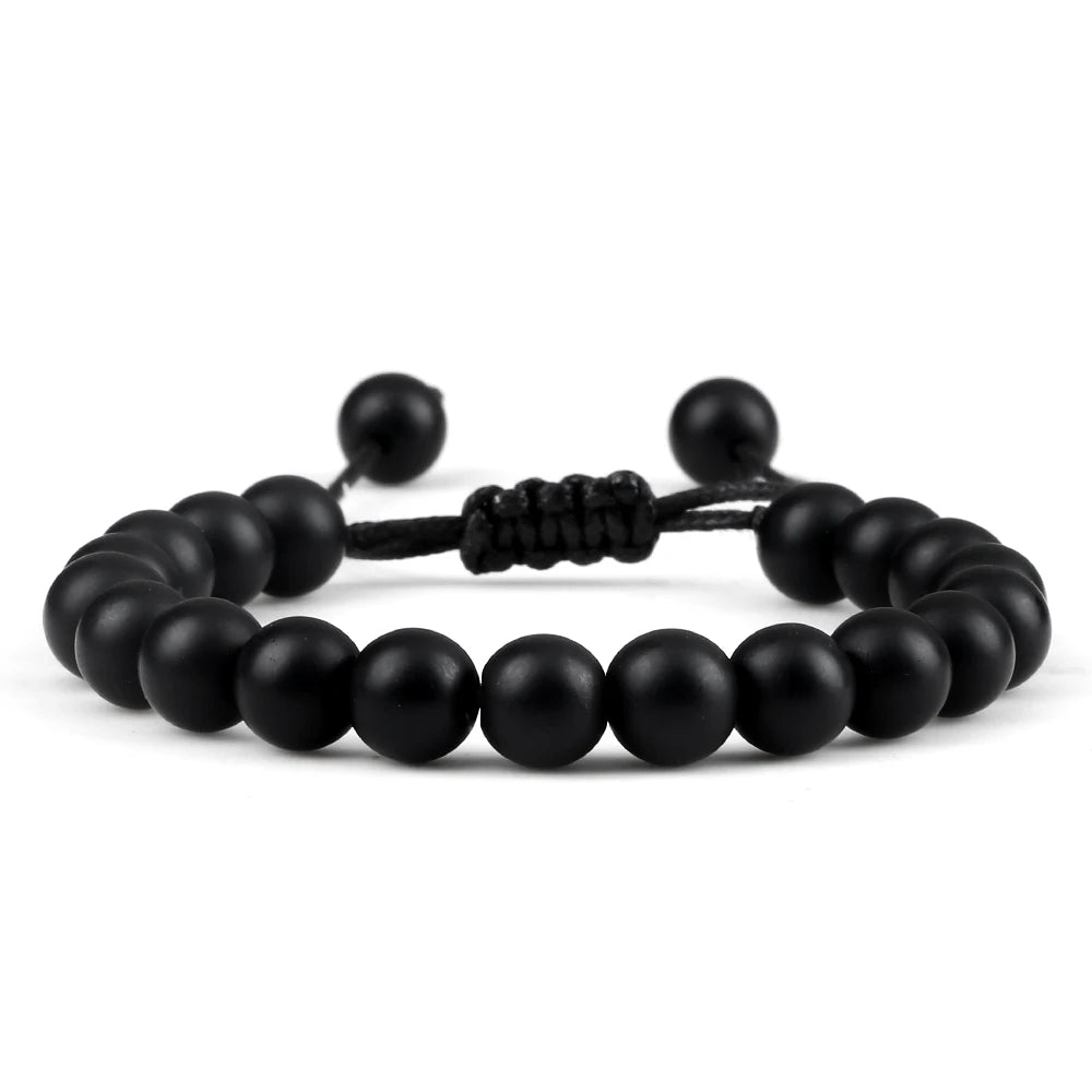 Black beaded bracelet on a white background
