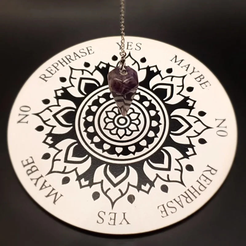Circular mandala pendant with text on a black background