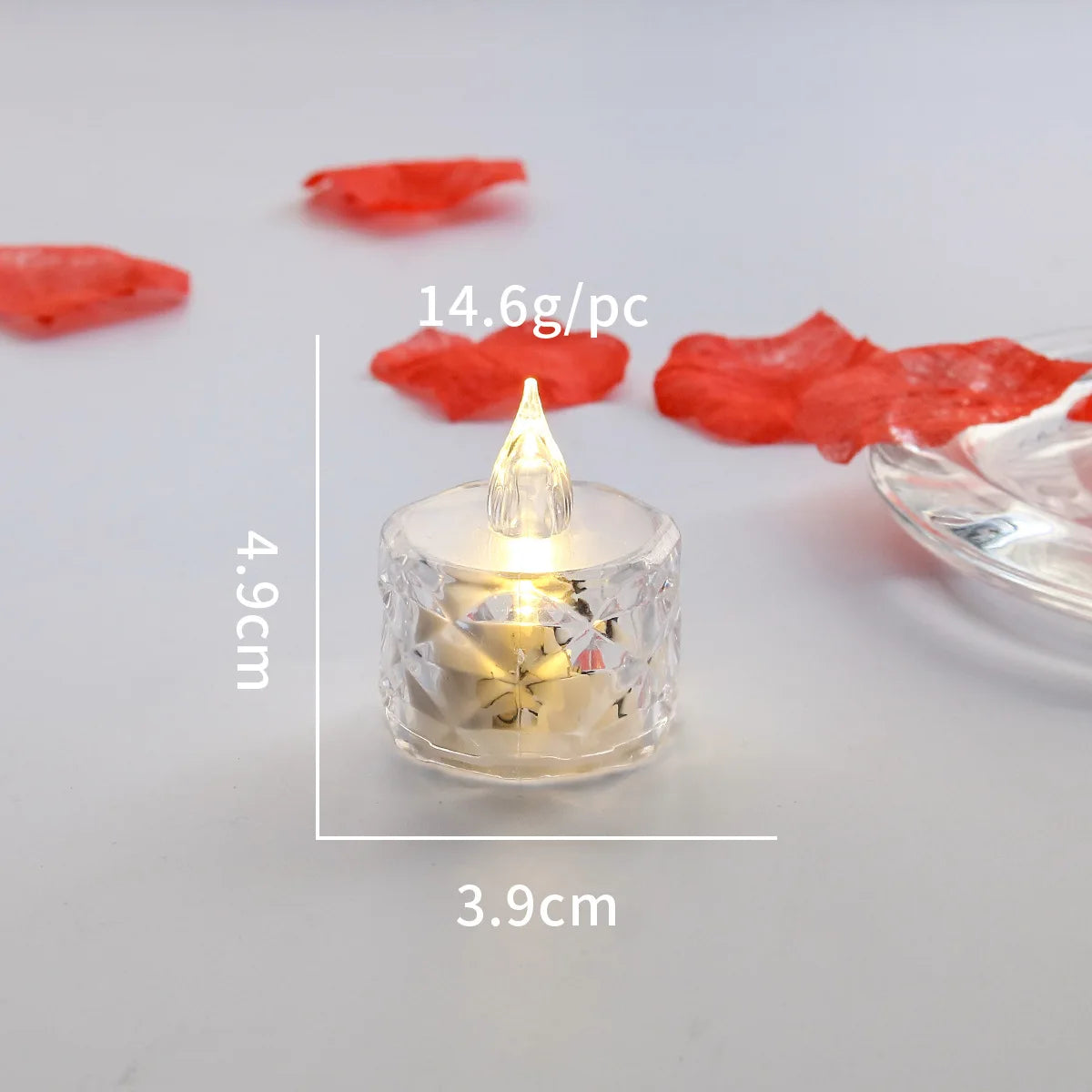 Small lit candle with measurements and weight details on a light background