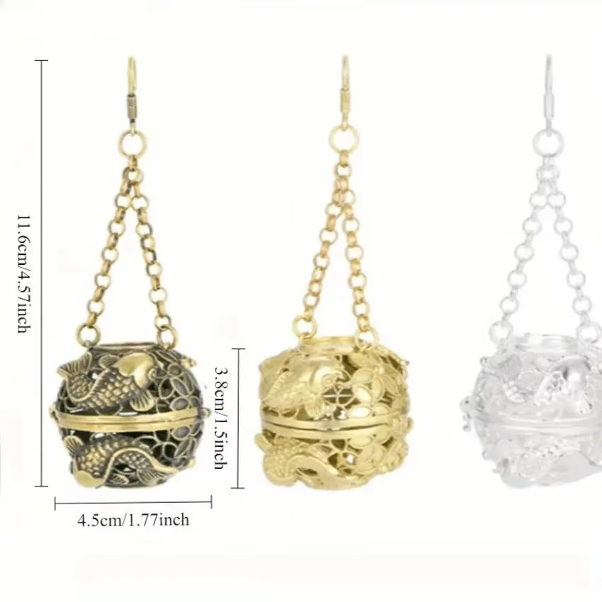 Three decorative metal balls with chains, one gold, one silver, and one bronze, shown with measurements on a white background.