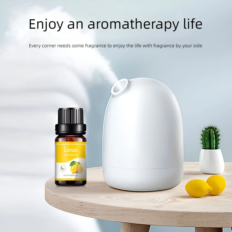 Aromatherapy diffuser with lemon essential oil bottle on a wooden table, with text 'Enjoy an aromatherapy life'.