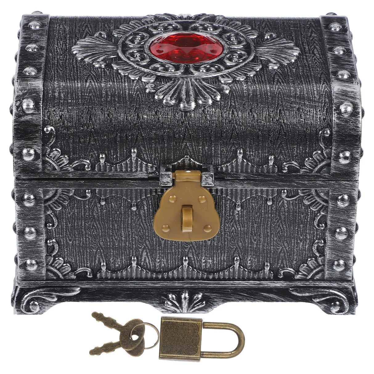 Decorative chest with intricate designs and a red gemstone on a white background