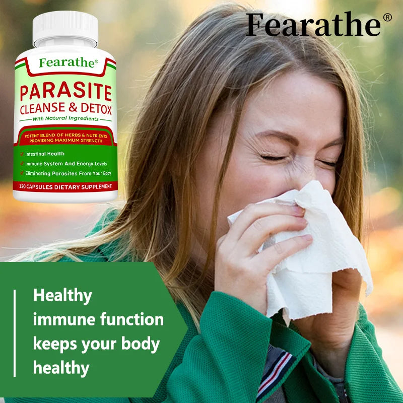 Woman with a tissue next to a bottle of Fearathe Parasite Cleanse & Detox supplement.