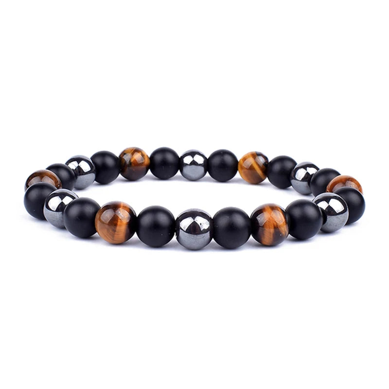 Beaded bracelet with black, brown, and silver beads on a white background
