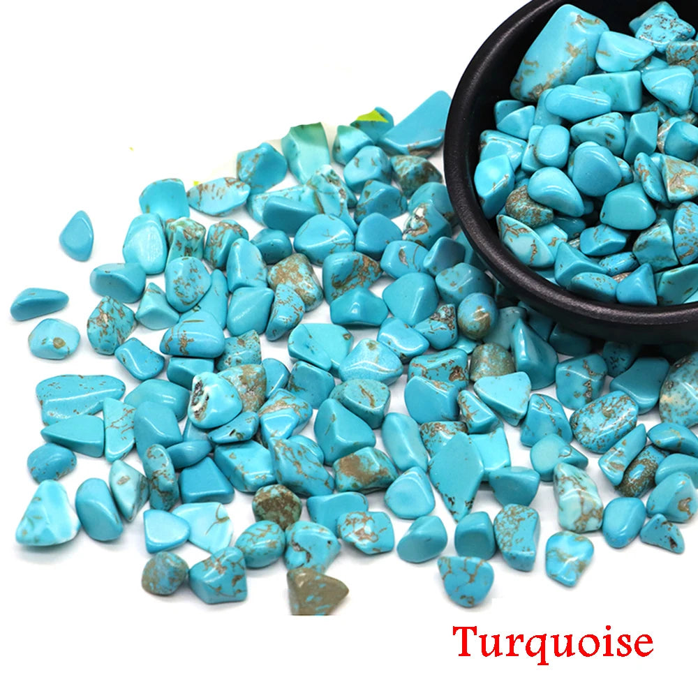 Turquoise stones with a bowl on a white background