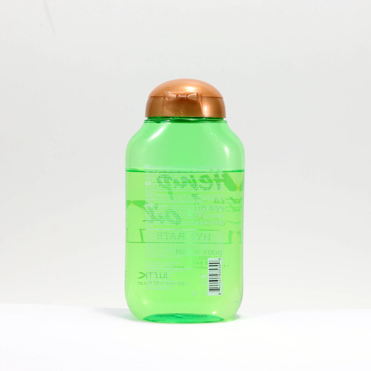 Green water bottle with a copper cap on a white background