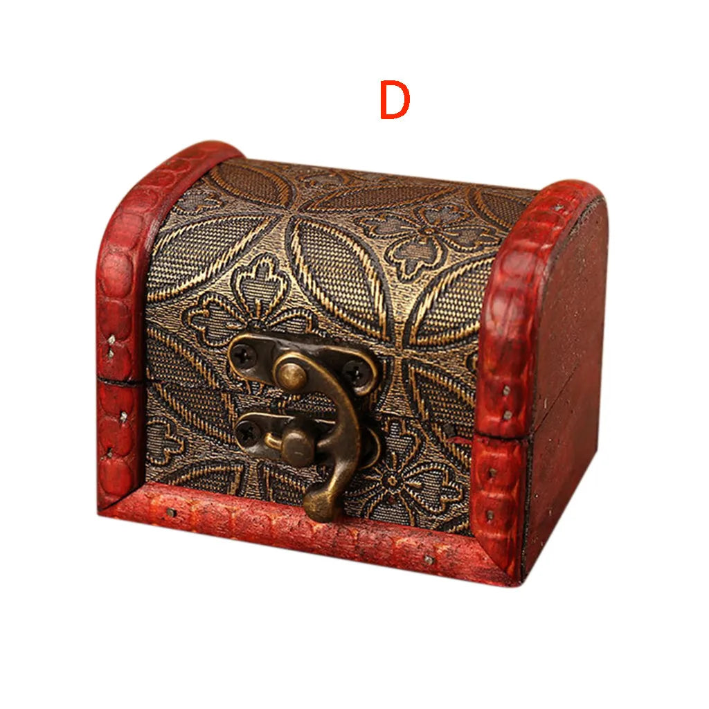 Decorative jewelry box with red and gold accents on a white background