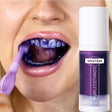 Person using purple toothpaste and brush with 'Whiten' branded toothpaste container.