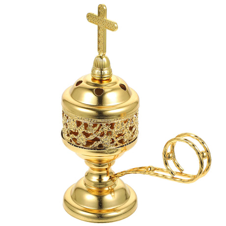 Gold censer with cross on top on a white background