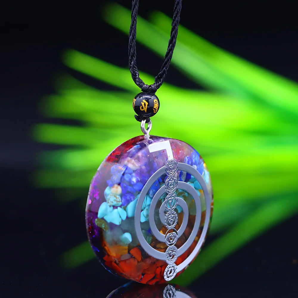 Colorful pendant necklace with intricate design on a dark background