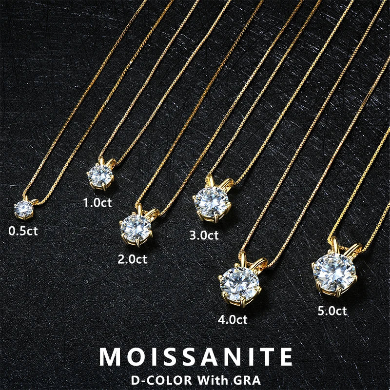 Gold necklaces with moissanite pendants of different carat weights on a black background.