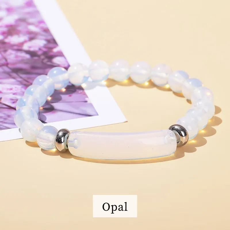 Opal bracelet on a beige background with 'Opal' label