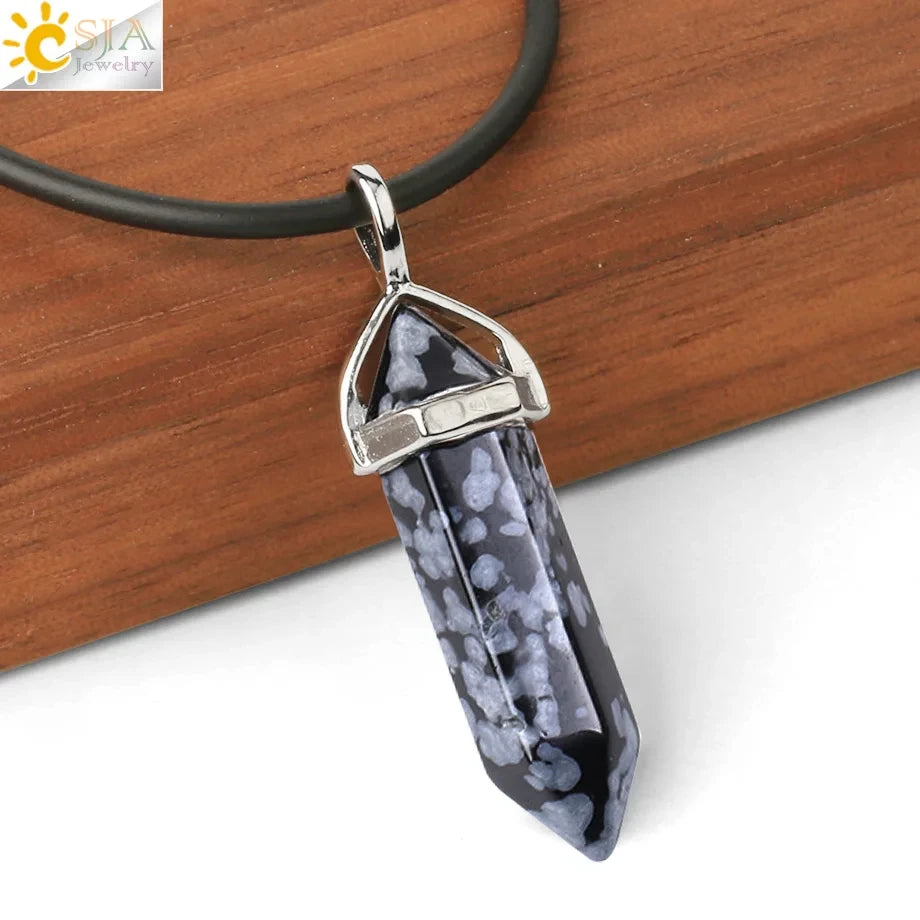 Crystal pendant necklace on a wooden surface with 'C&A Jewelry' branding.