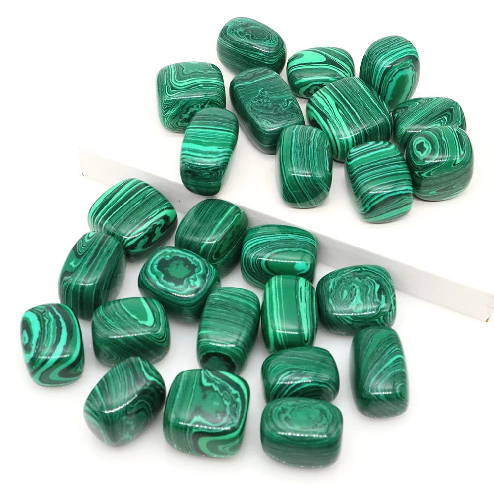 Green marbled stones on a white background