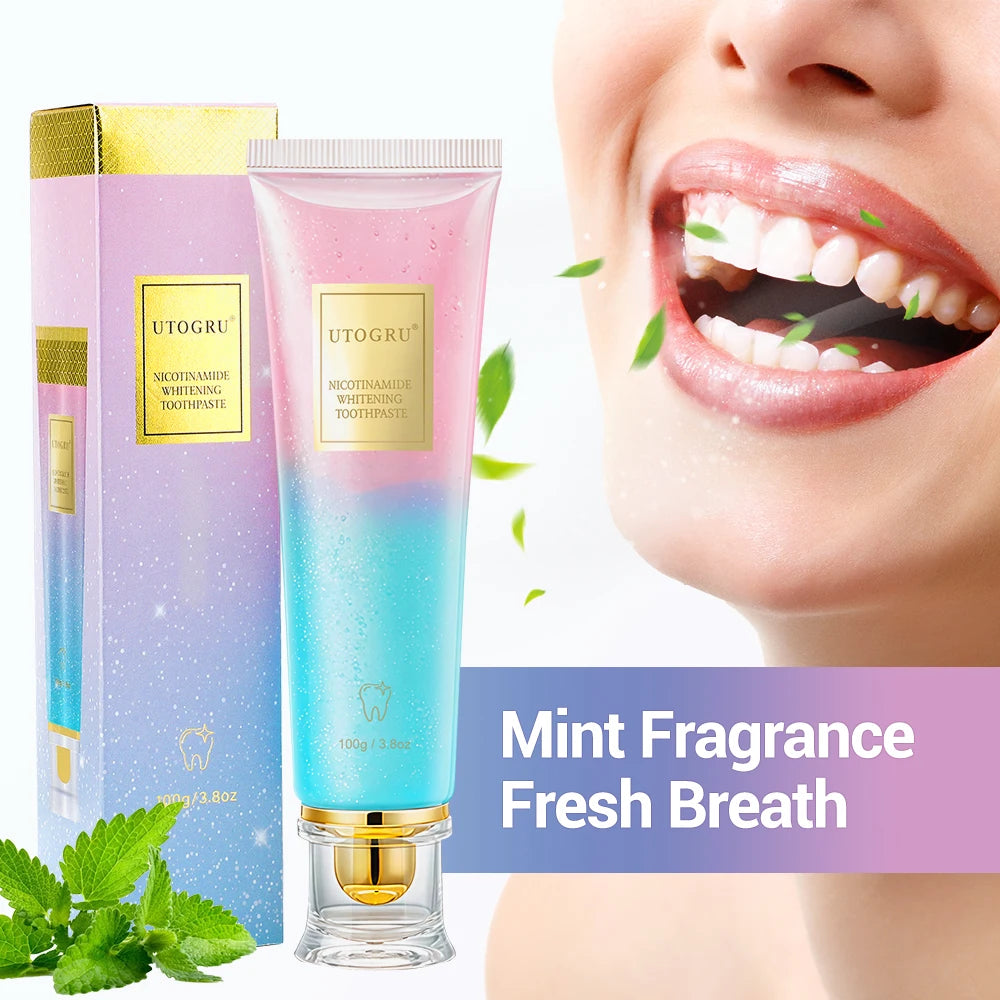 UTOGRU toothpaste tube and packaging with mint leaves, showing a close-up of a mouth with fresh breath.