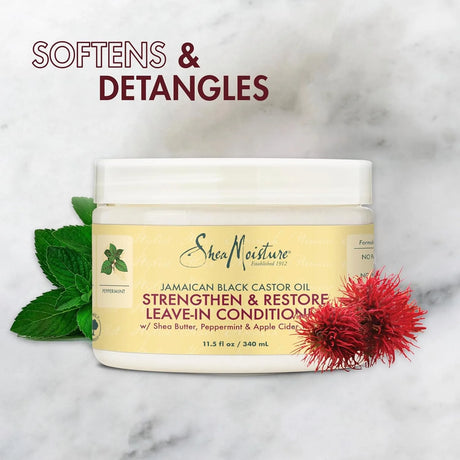 SheaMoisture leave-in conditioner jar with natural elements on a marble background
