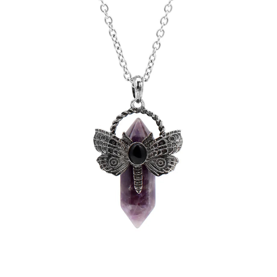 Necklace with a purple crystal and silver butterfly pendant on a white background