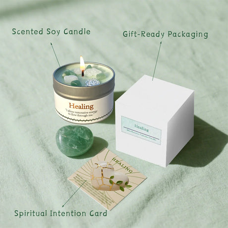 Scented soy candle with packaging and intention card on a light green background