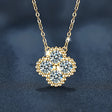 Gold necklace with a diamond pendant on a dark background