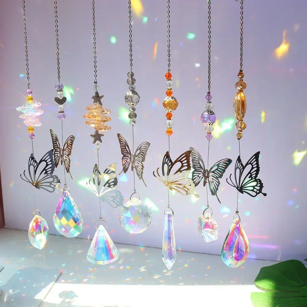Decorative hanging elements with butterflies and crystal-like shapes on a white background.