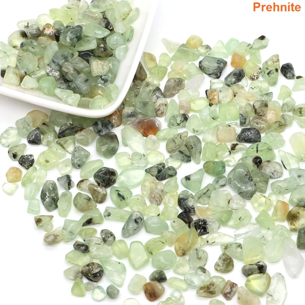 Prehnite stones with a small white dish on a white background