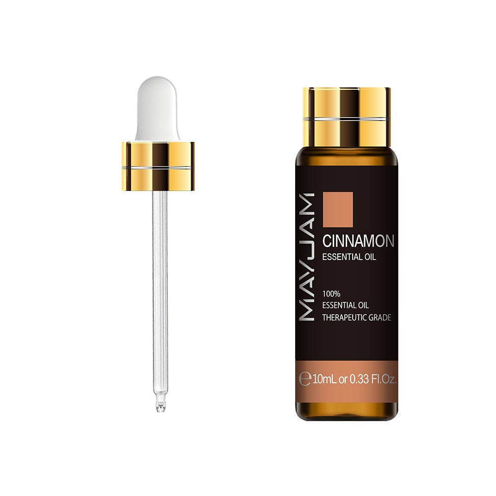 MayJam cinnamon essential oil bottle with dropper on a white background