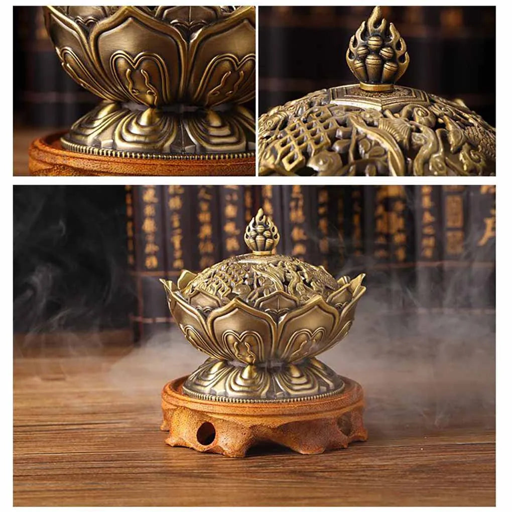 Bronze incense burner with intricate designs on a wooden stand, surrounded by books.