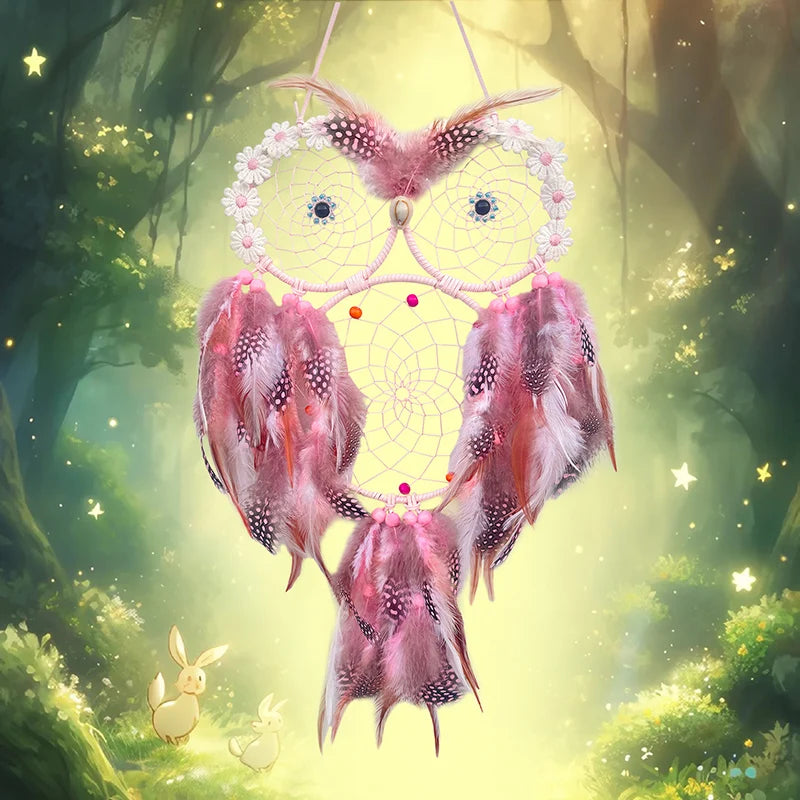 Pink owl-shaped dreamcatcher with feathers against a forest background