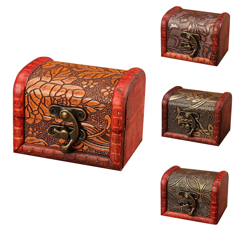 Set of three decorative wooden treasure chests with intricate designs and locks on a white background.