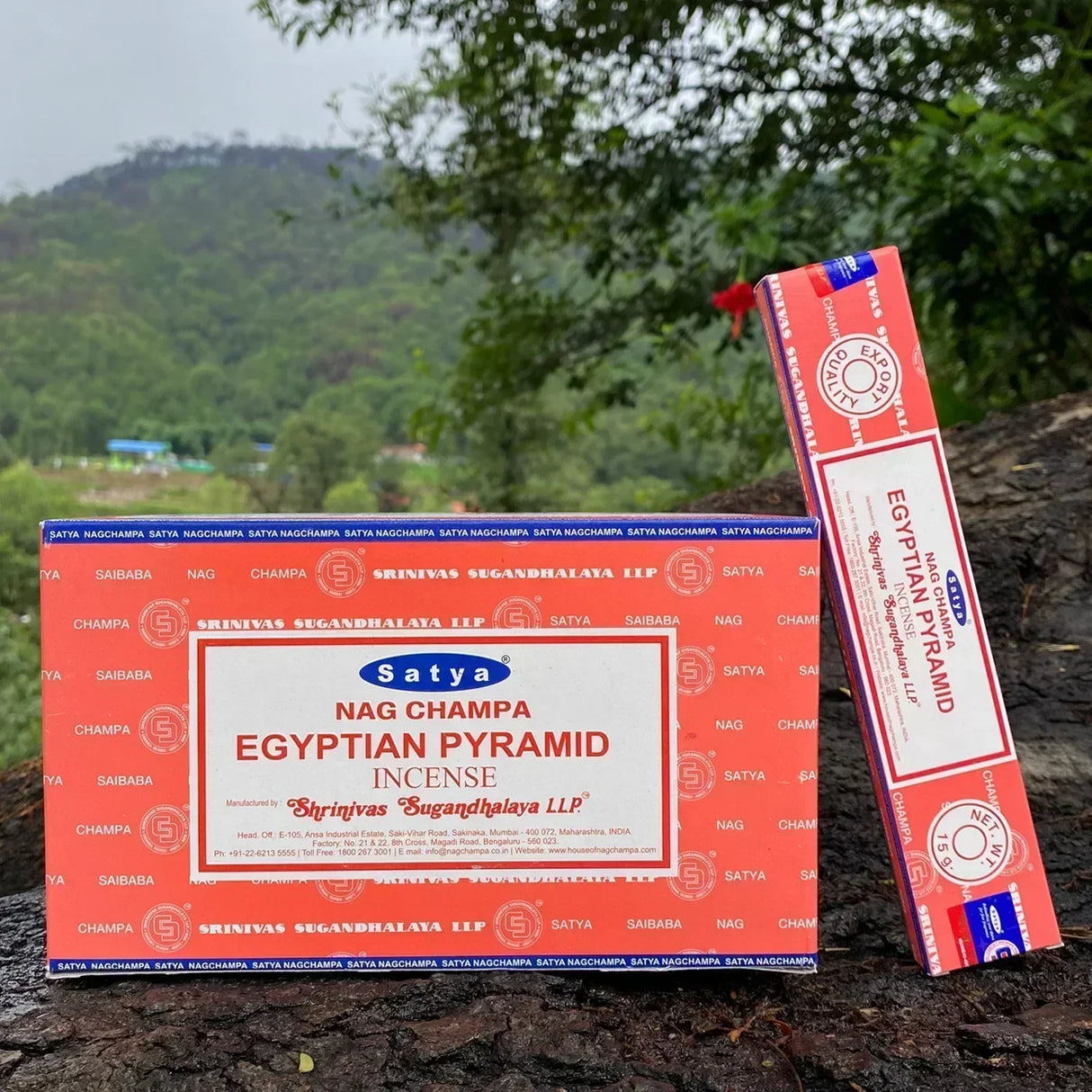 Satya Nag Champa Egyptian Pyramid incense box and packets on a natural background