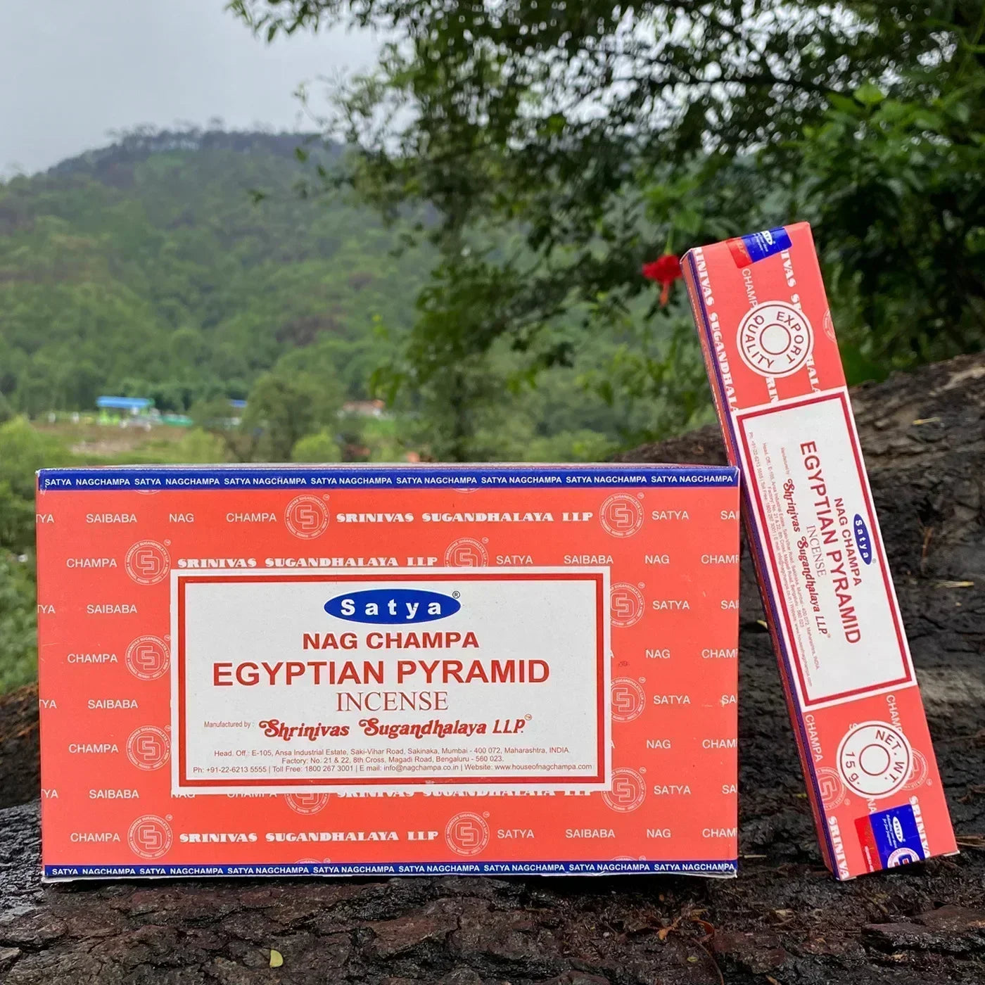 Satya Nag Champa Egyptian Pyramid incense box and packets on a natural background