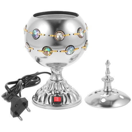 Decorative silver lamp with crystal accents and power cord on a white background