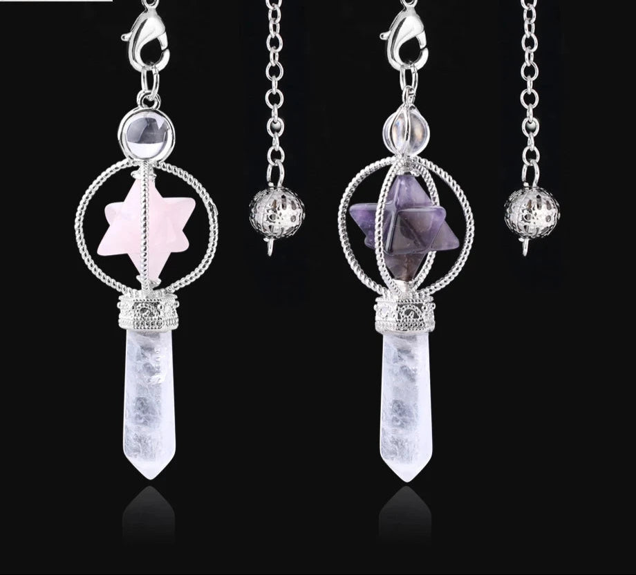 Crystal pendant necklaces with star-shaped ends on a black background, branded as 'Cilia'.