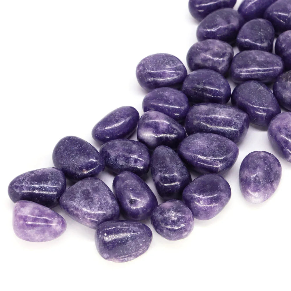 Purple stones on a white background