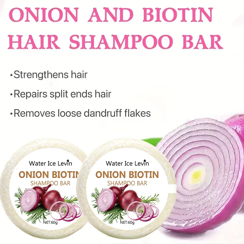 Onion and Biotin hair shampoo bars with an onion half on a white background