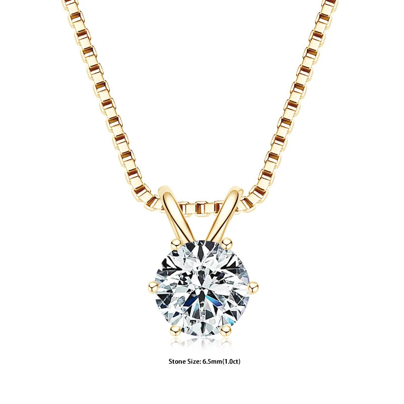 Gold necklace with a round diamond pendant on a white background