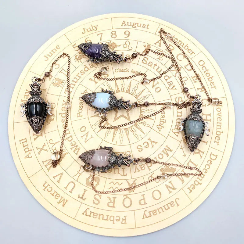 Necklaces with gemstones on a circular astrological chart